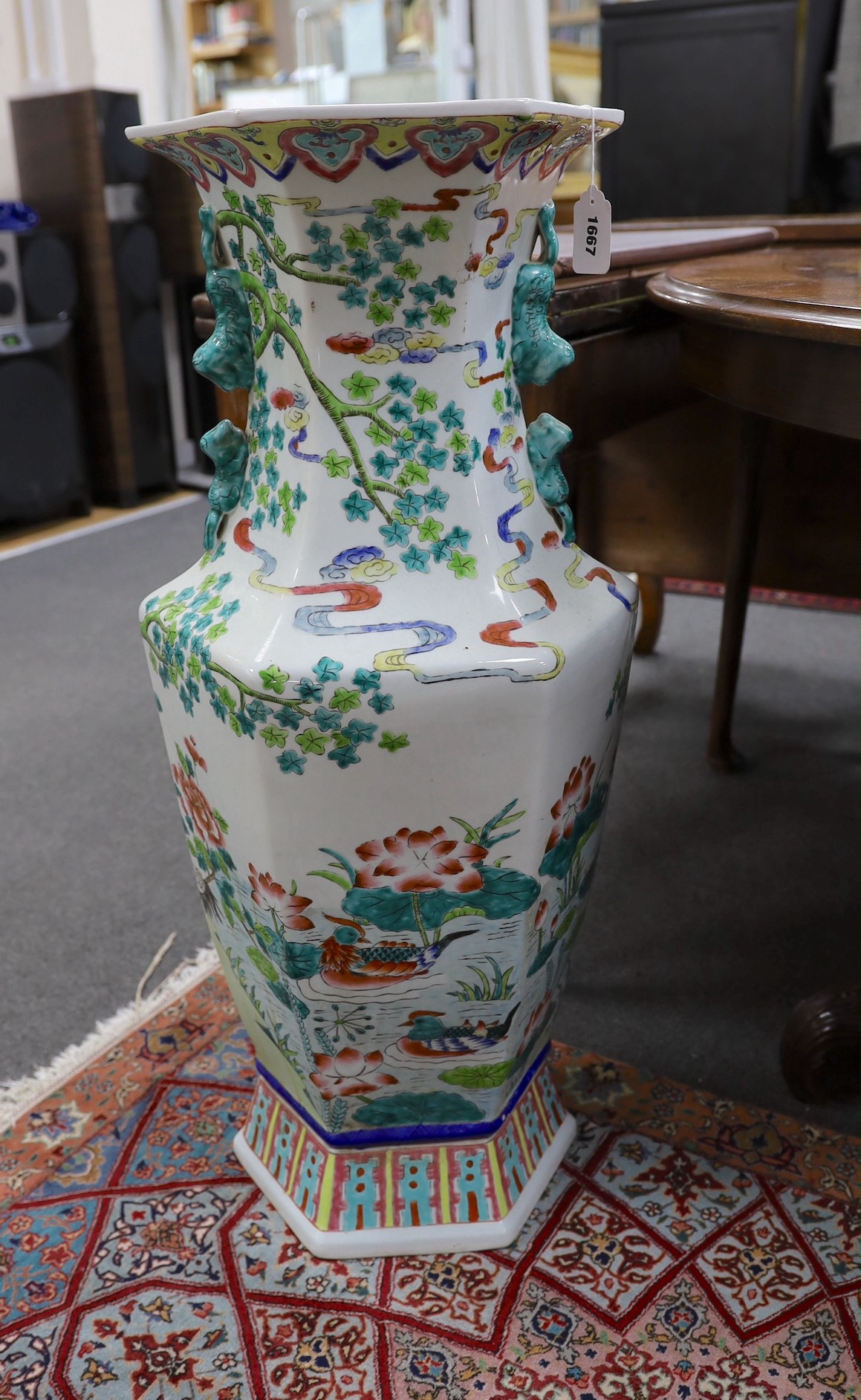 A large famille rose Chinese ‘phoenix and bird’ vase, 85cm high